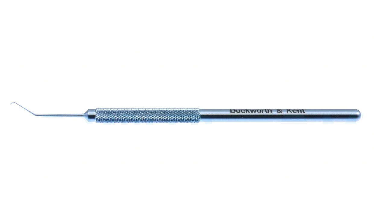 D&K nucleus rotator 4 3/4" angled shaft 10.0mm from bend to tip curved left 0.2mm x 0.3mm tip 1.75mm tip length left hand surgeon round handle titanium